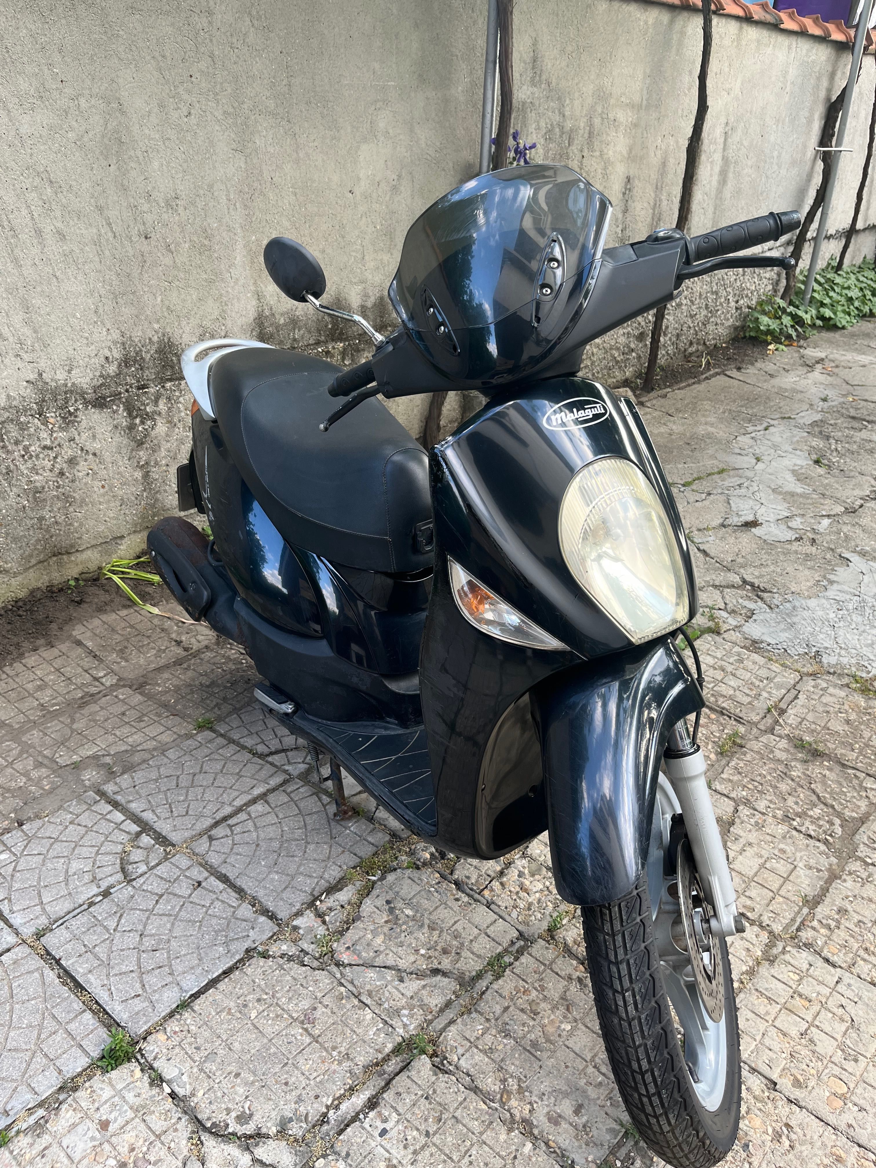 Скутер 125 кубика