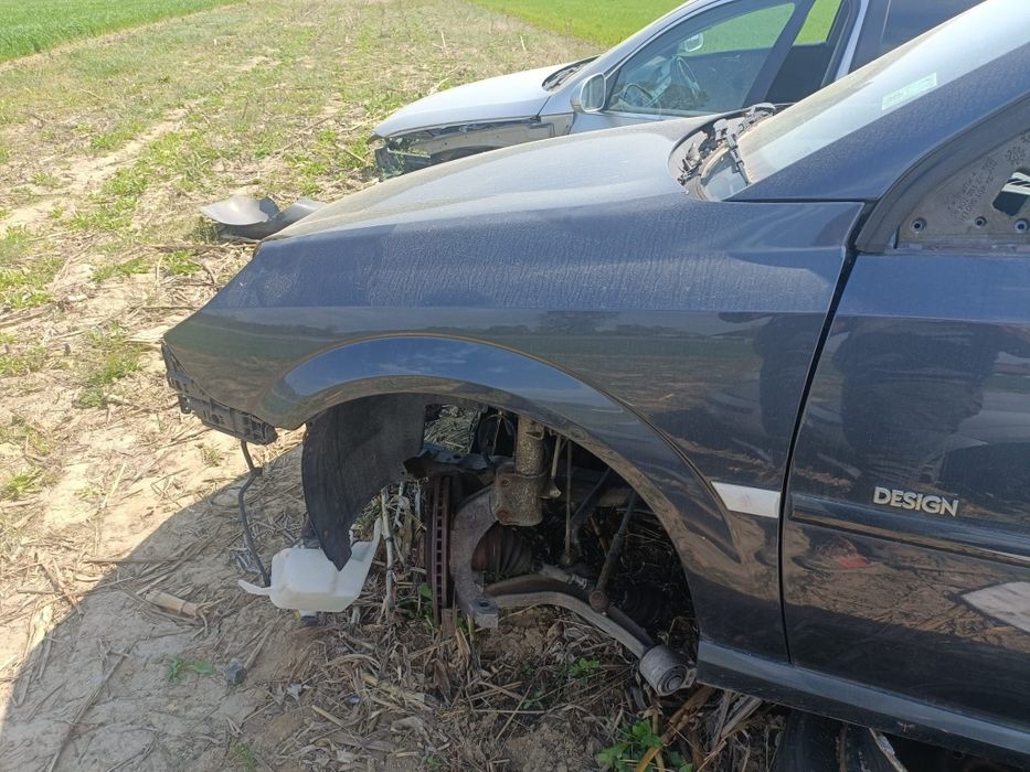 Aripa stanga fata Opel vectra C facelift 2009