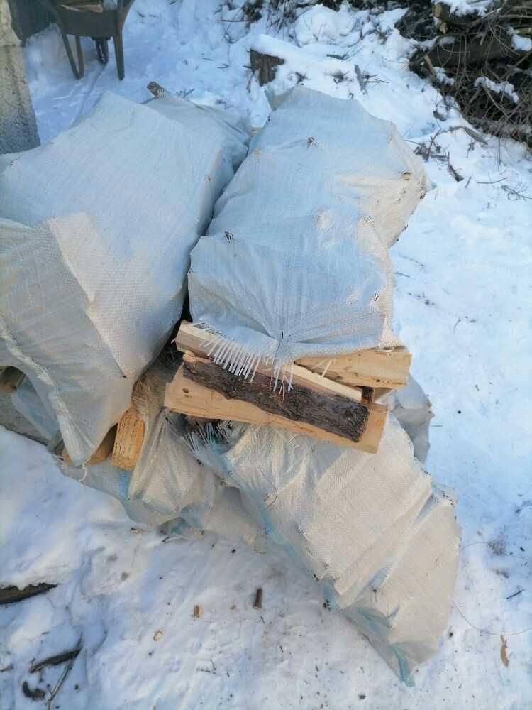 Продам сухие  дрова в мешках