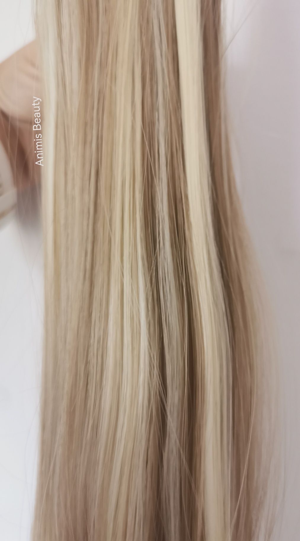 coada de par BLOND suvite (imita par natural)