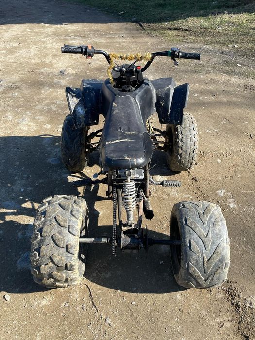 Vând atv 125cc funcționează foarte bine preț neg