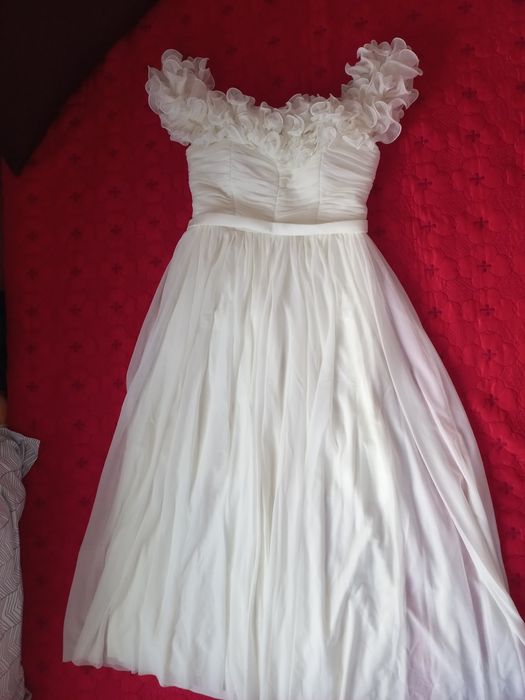 Vând rochiță în stare impecabilă