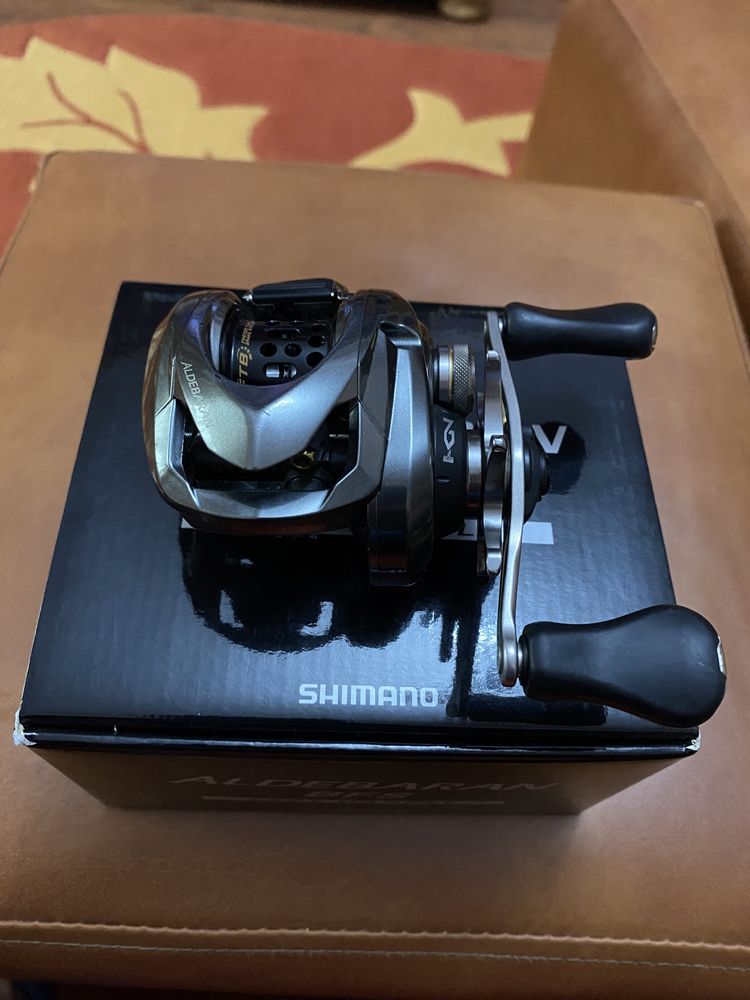 shimano aldebaran și daiwa pr 100 cu lansete