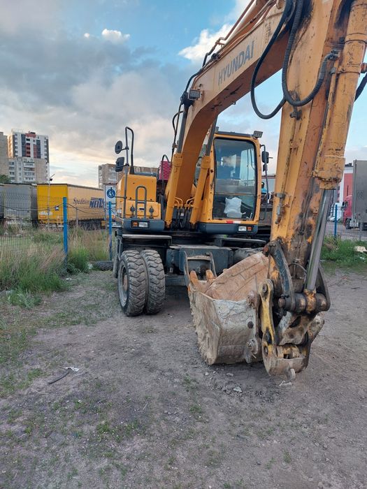 Услуга эксковатора колесный