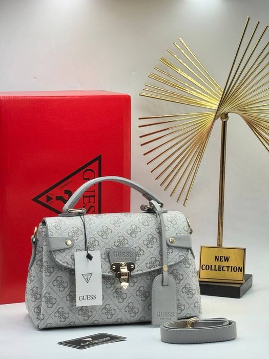 Geanta Guess noua !!! Dimensiuni 24/19 !!!