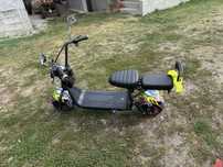 vamd scuter electric