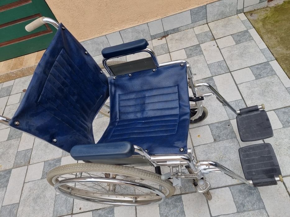 Scaun  cu rotile,carucior