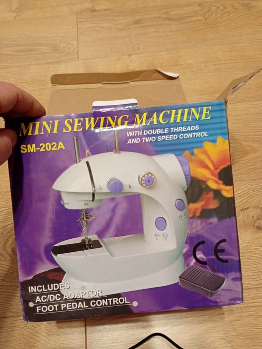 Mașină de cusut electrică