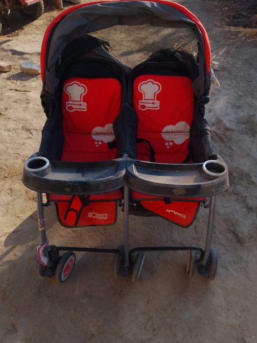 Коляска егизакларга