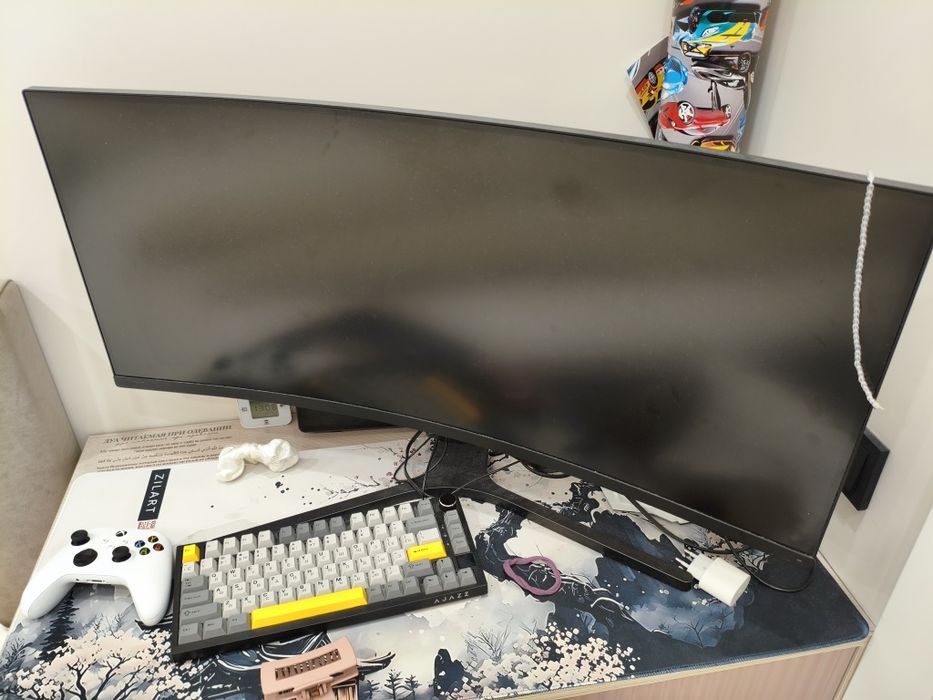 Это монитор Xiaomi Mi Curved Gaming Monitor 34″, модель XMMNTWQ34.