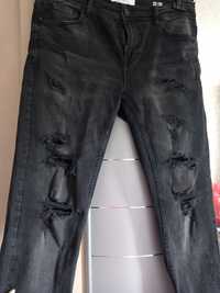 Продам шикарные рванные джинсы черно серого цвета
