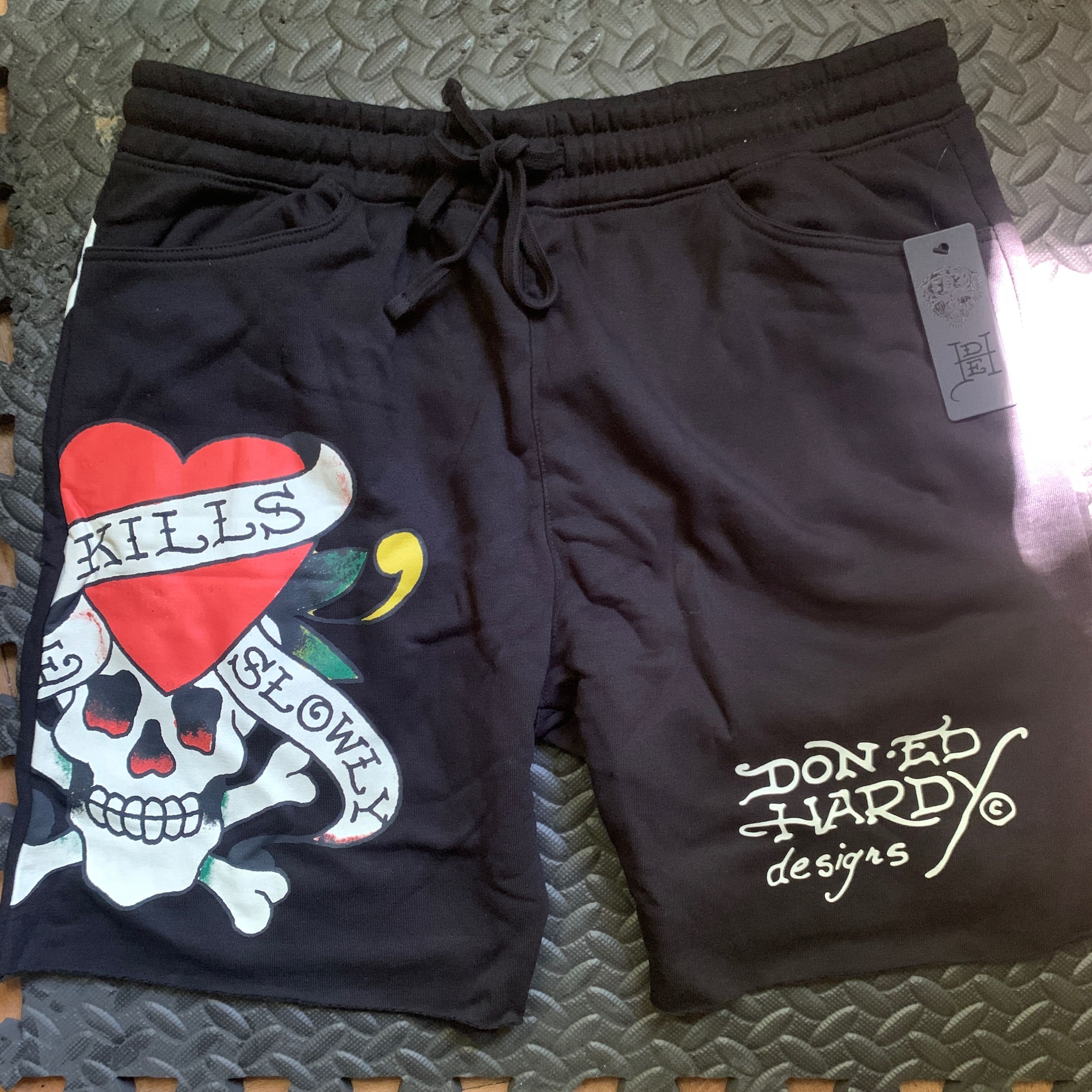 Don Ed Hardy • •
