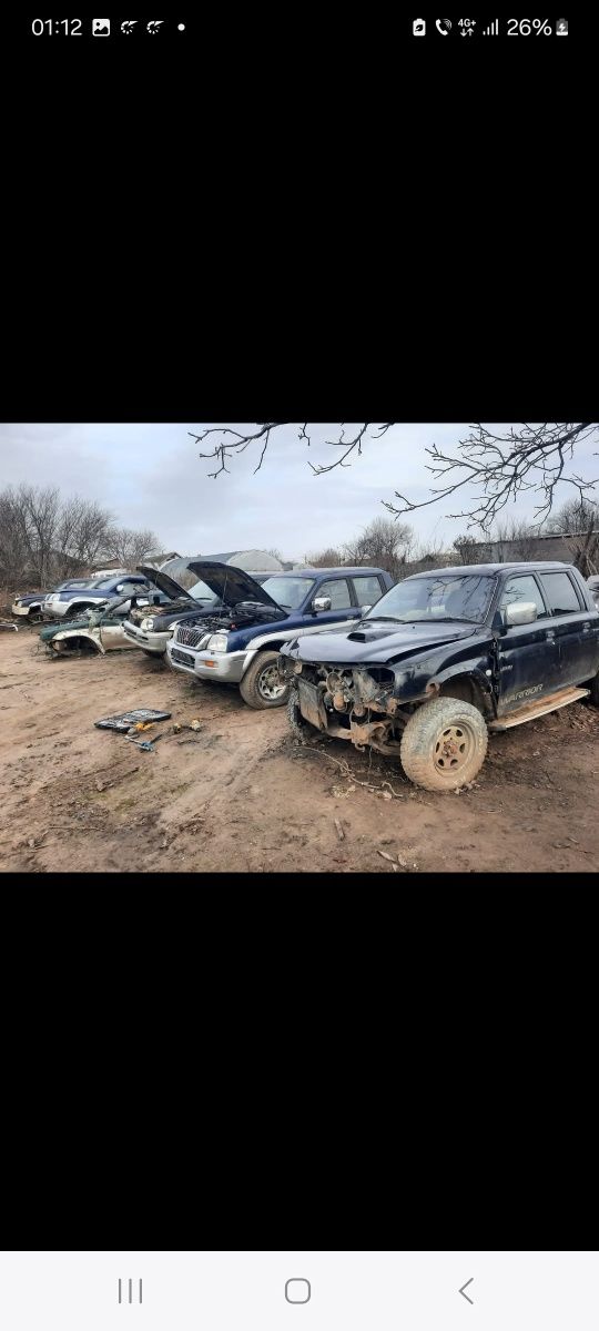 Dezmembrez Mitsubishi l200  2.5 diesel din 2004