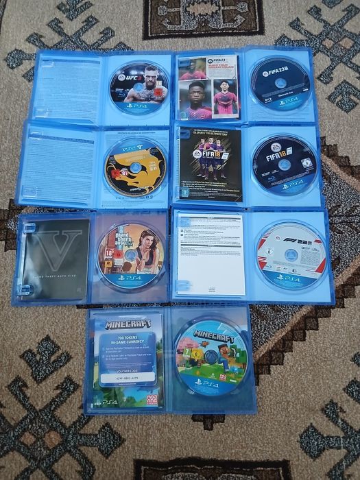 PS 4 slim 8 jocuri + volan