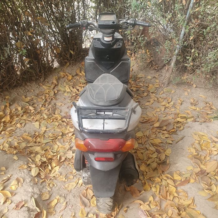 Скутер Daelim A Four