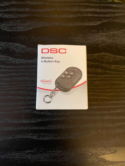 Telecomanda sistem alarma cu 4 butoane DSC seria Neo.