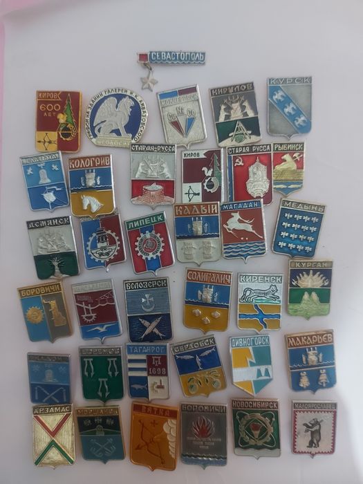 Значки города России.