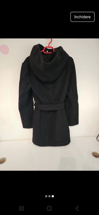 Palton nou cu eticheta