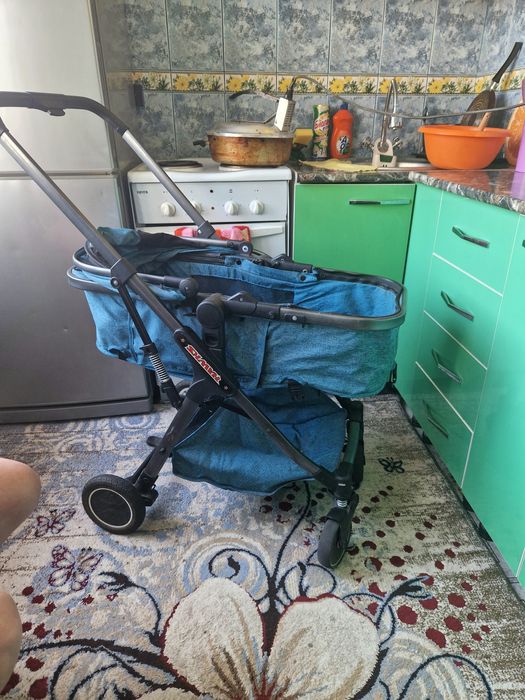Продам компактную коляску