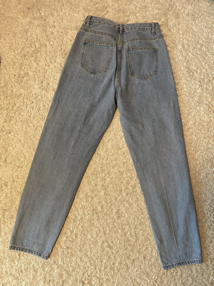 Ripped blue jeans