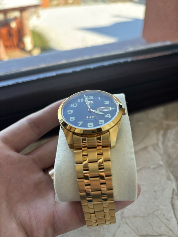 Orient tristar gold