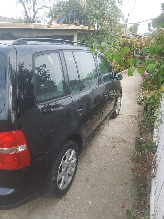 Vind Volkswagen tip.1T.varianta .BSEAC. anul 2006.motor.1.6. fsi.benzi