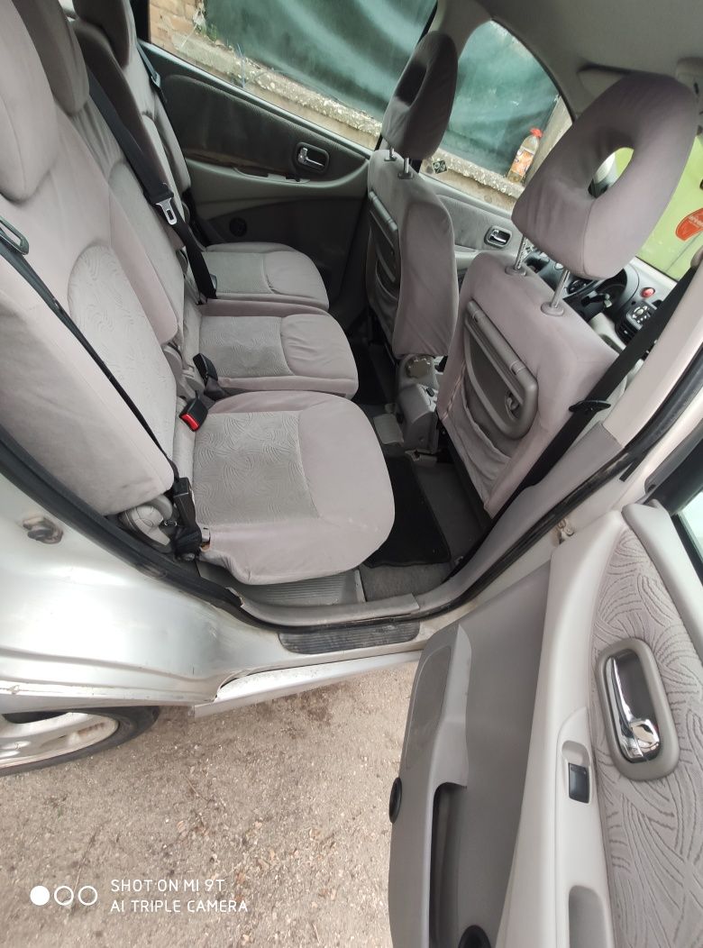 Nissan Almera Tino 2.2d на части
