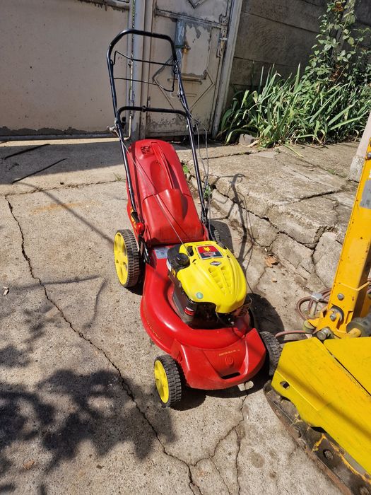 Vand masina de tuns iarba gazonul  Wolf Garden