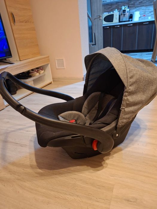 Scoică auto utilizata cu mâner reglabil