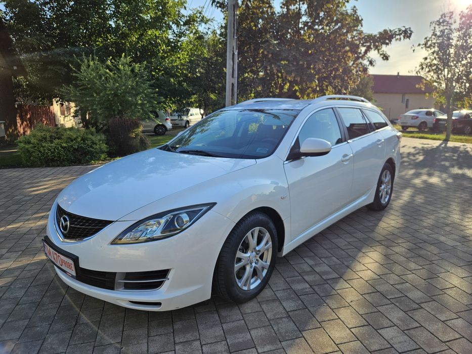 Mazda 6 an 2010 clima