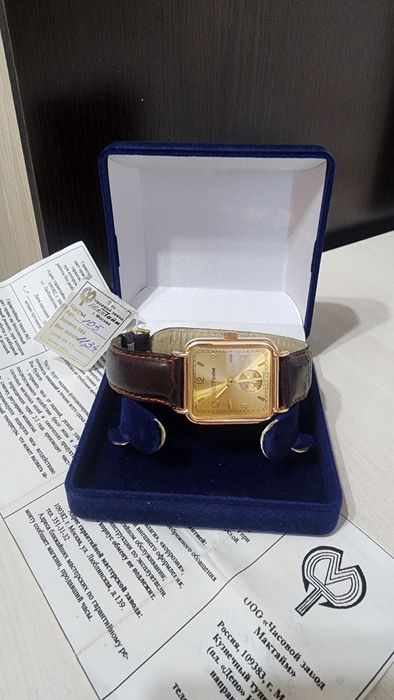 Золотые часы.с паспортом.