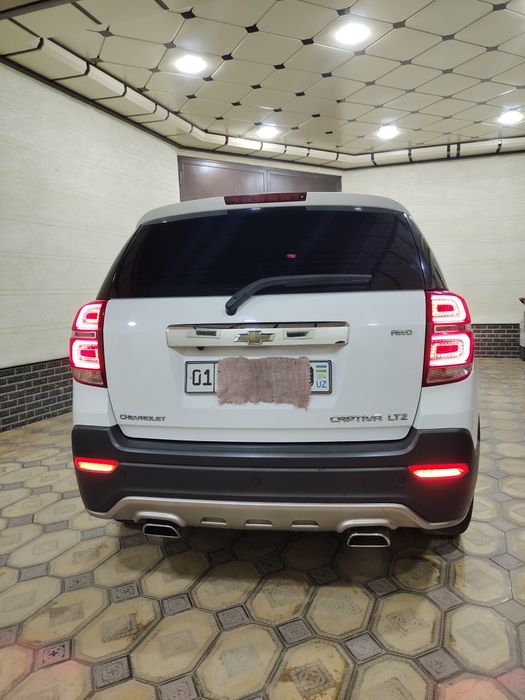 Captiva 4 qilingan xujjatdayam Avtomat rangi Oq benzinda.