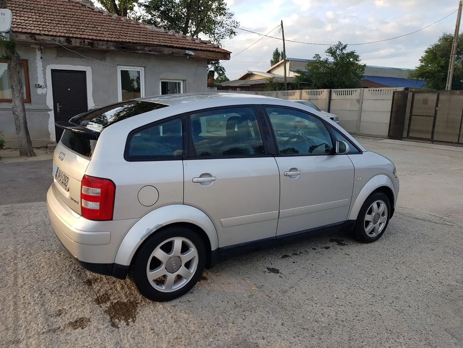 Usa stanga fata / Usa dreapta spate/Usa stanga spate/ Bara spate Audi A2 gri