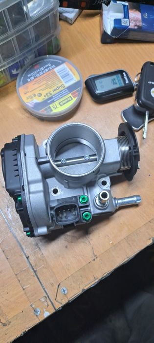 Дроссельная заслонка на двигател NEXIA, LACETTI F16D3