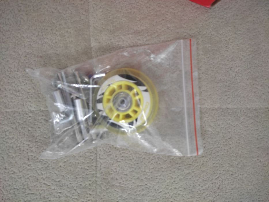 Роликовые коньки