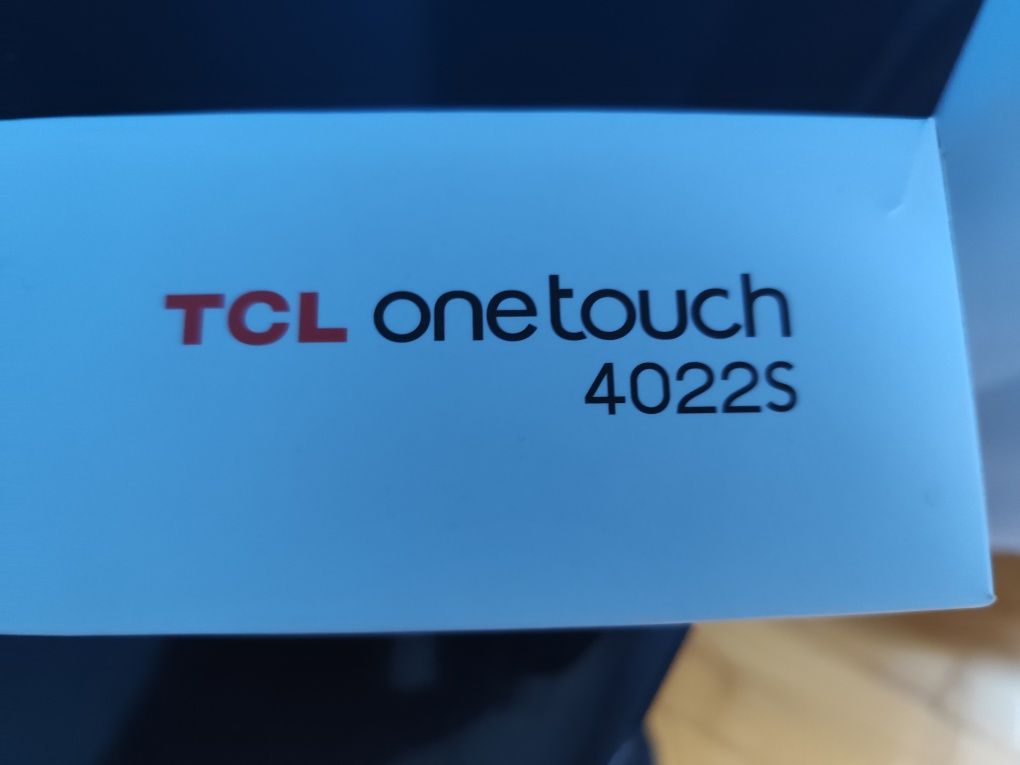 Телефон TCL onetouch