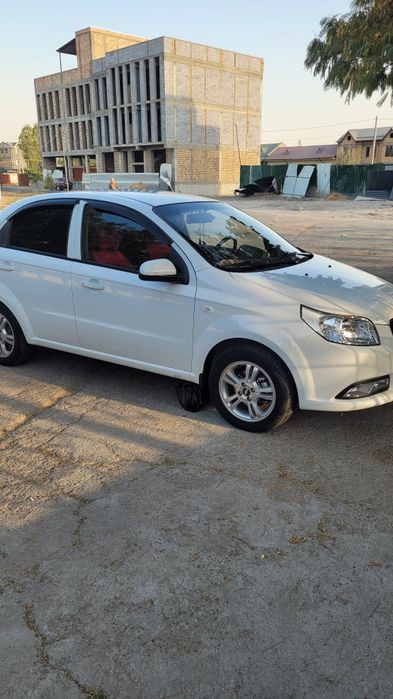Нексия 3 белая автомат