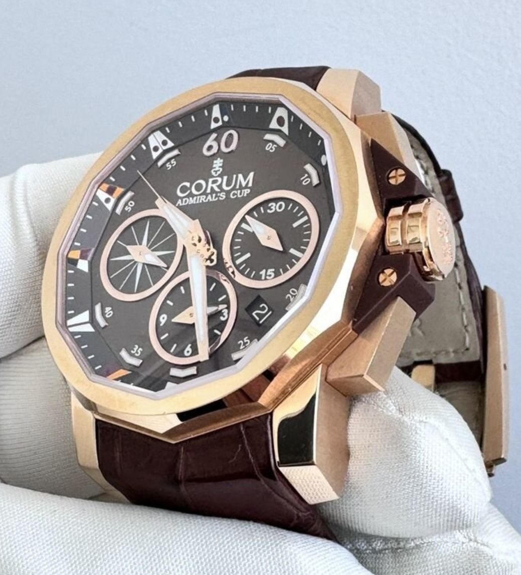 Швейцарские золотые часы Corum!