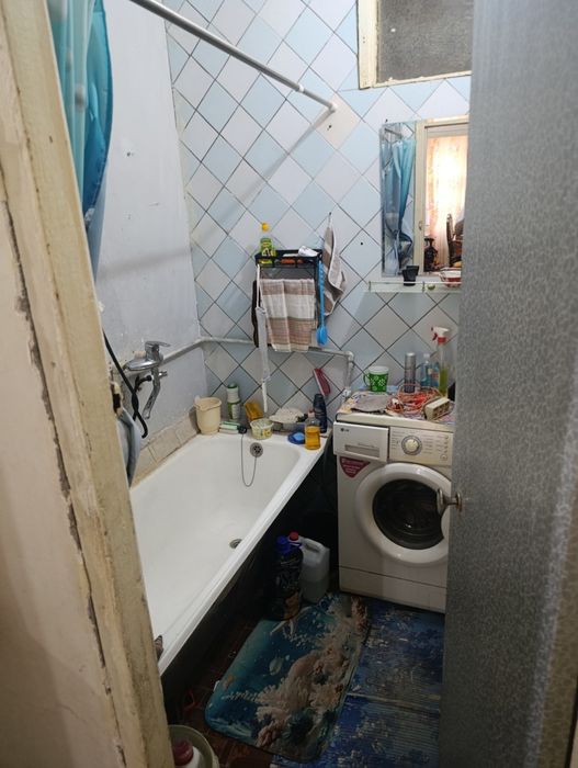 Спутник 17 да жойлашган 3 хонали хонадон — 1-қават, ҳовлиси билан,