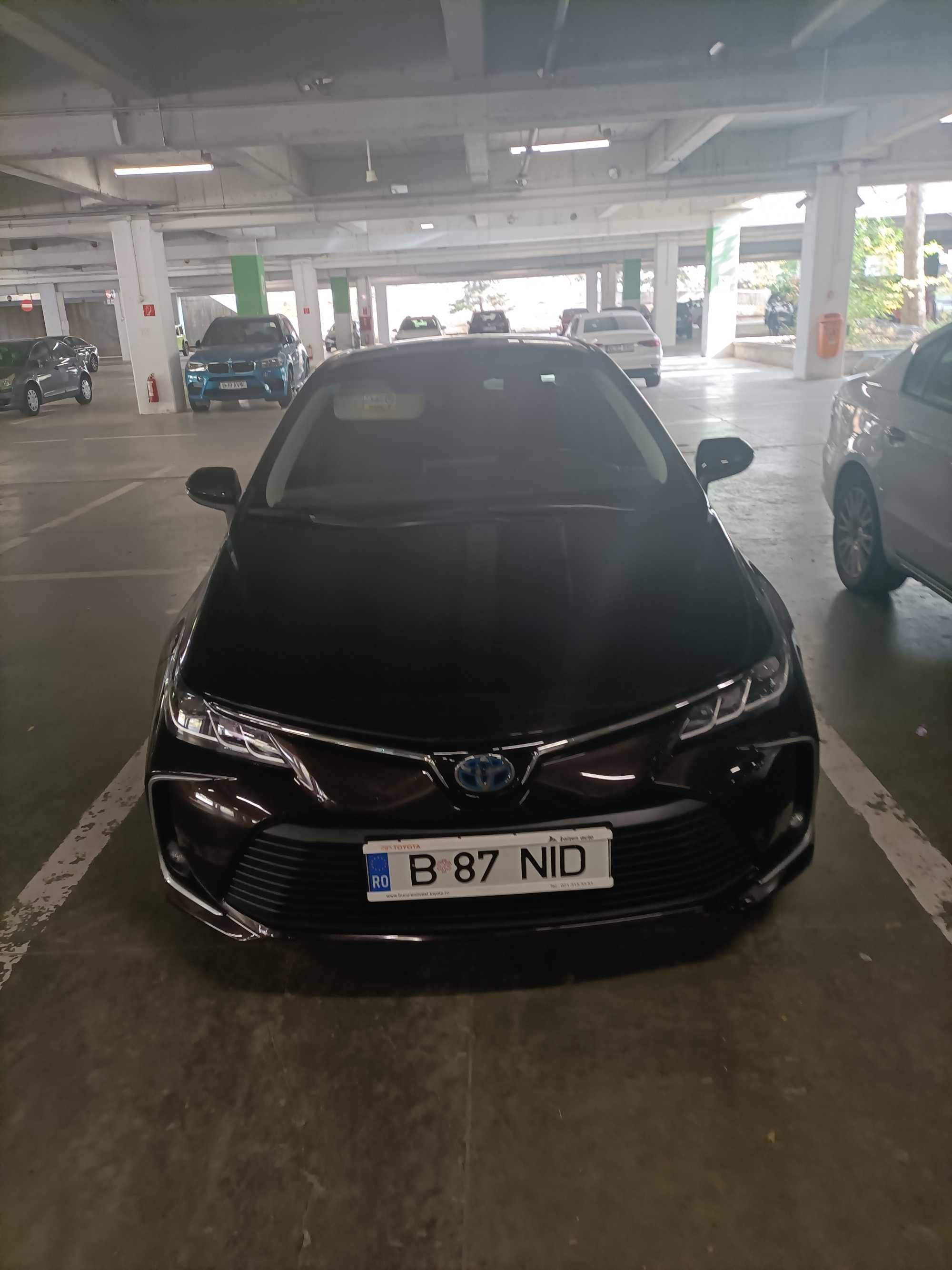 Toyota Corolla Sedan, 1.8, hibrid, culoare maro cameleon