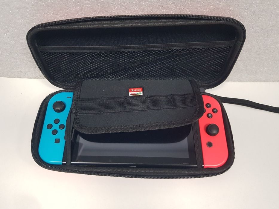 Nintendo Switch pachet complet+geanta transport+husa mica+joc M&L Bro