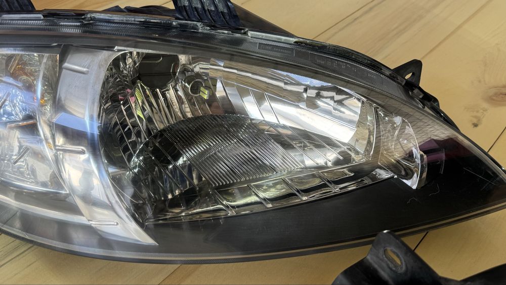 Фары передние жентра