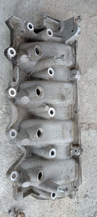 Впускной коллектор Рено Логан 1.6