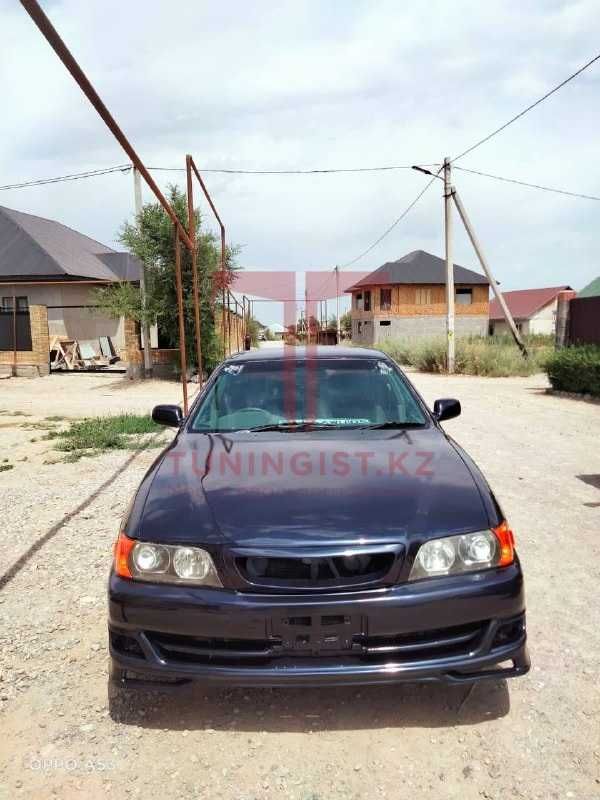 Передняя губа тюнинг обвес Tourer на Toyota Chaser 100