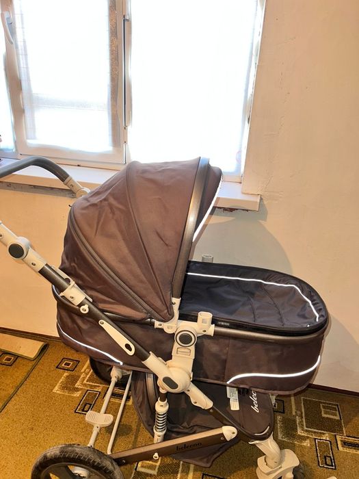 Детская коляска с люлькой и прогулочным блоком