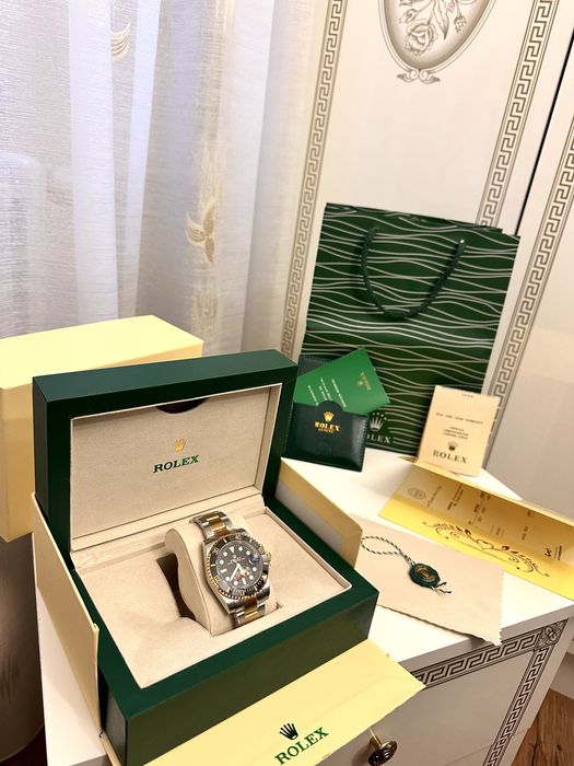 Rolex Submariner 41 mm gold and steel saphire glass
