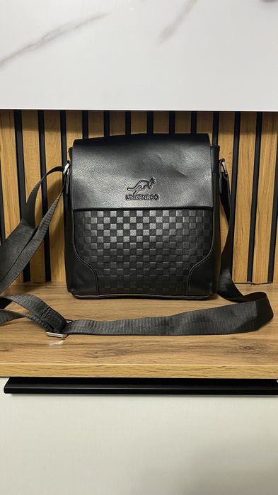 Барсетка новый .