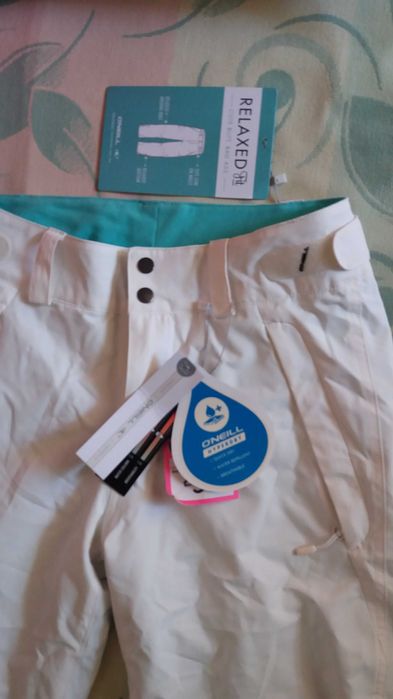 Vand pantaloni de ski pentru dama, albi cu captuseala turcoaz, mar.S