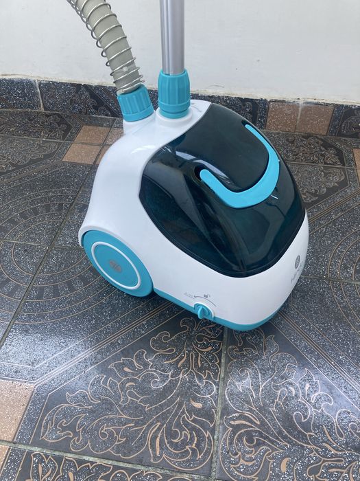 Aparat de calcat vertical cu abur