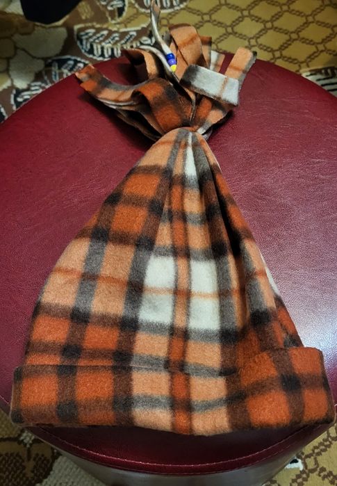 Vând căciuli călduroase